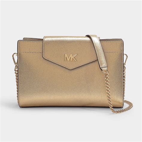 michael kors gold bow crossbody|Michael Kors Crossbody bag.